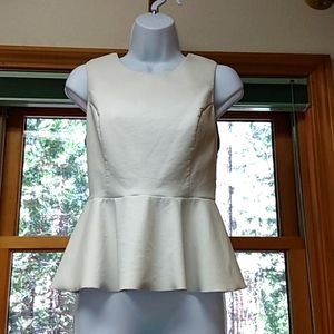 Vegan leather white INC International Concepts top. Sleeveless, black back. NWOT